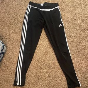 Black and white adidas pants